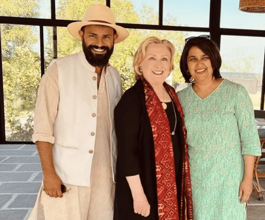 Testimonials 1 aparna and sahaj with hillary clinton